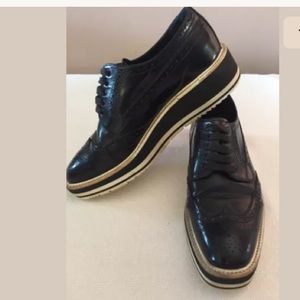 PRADA BLACK LEATHER WINGTIP PLATFORM OXFORDS